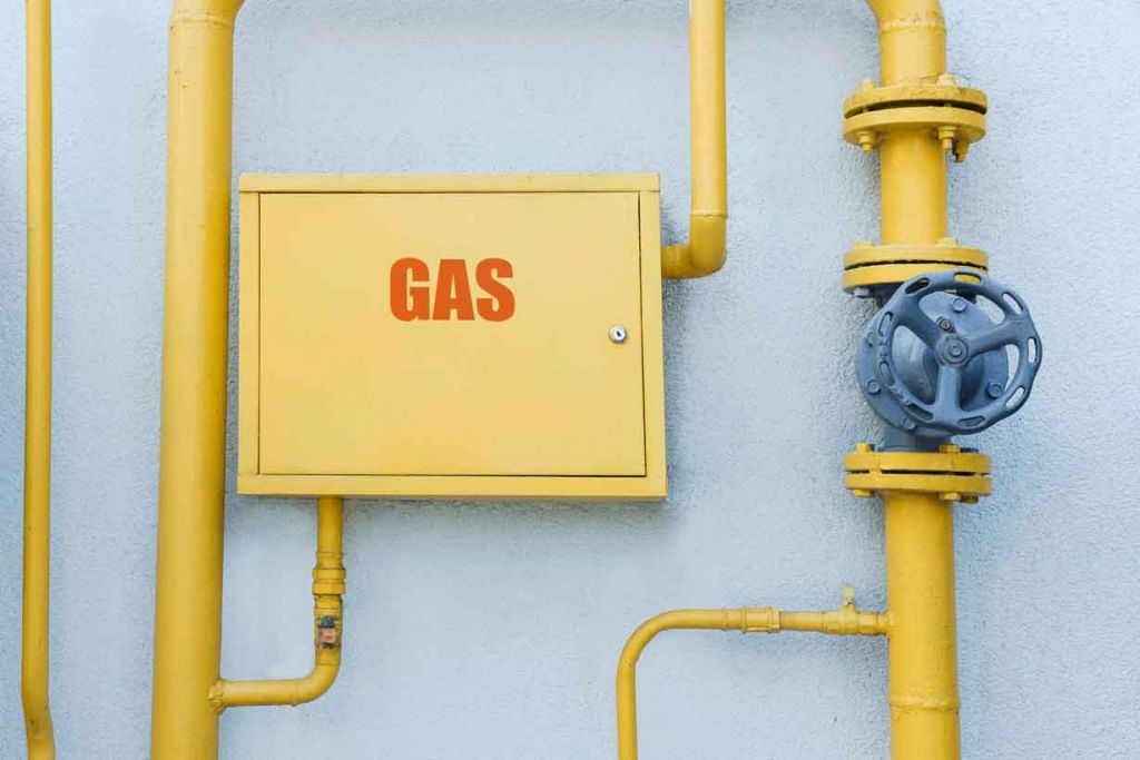 Generator Fuel Types and Tank Sizing for Home, Commercial, and Industrial Applications 9 1gas meter box and pipes near grey wall outdoors 2026 01 27 16 14 10 utc